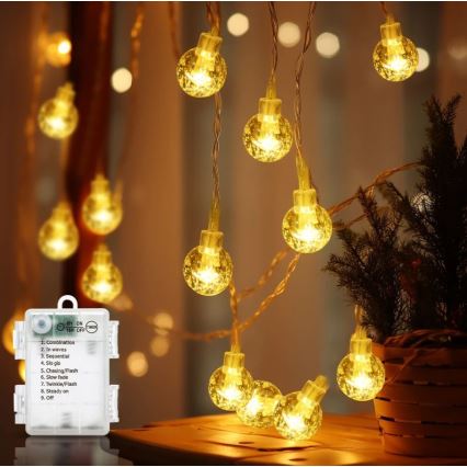 Aigostar - LED външна гирлянда 100xLED, захранване 3xAA, 8 режима, 10,3 m, IP44, топла бяла светлина