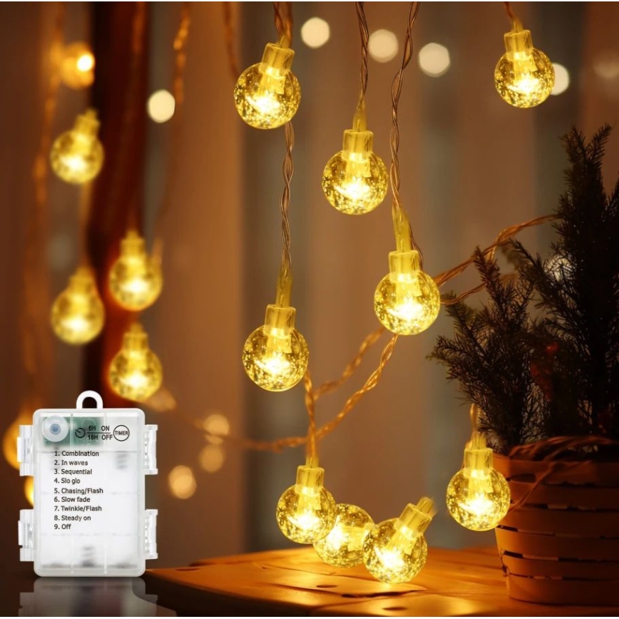 Aigostar - LED външна гирлянда 100xLED, захранване 3xAA, 8 режима, 10,3 m, IP44, топла бяла светлина