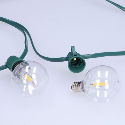 Brilagi - LED външен декоративен гирлянд GIRLANDA 25xE12/0,8W/230V 20m зелен IP44 топла бяла