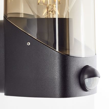 Brilliant - Екстериорен аплик със сензор MINOU 1xE27/10W/230V IP44 черен/опушен