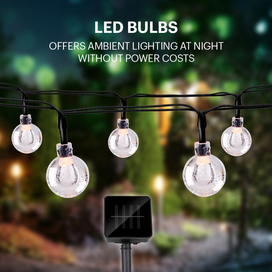 Grundig - LED Соларна верига 50xLED/8 функции 6,9m топло бяло