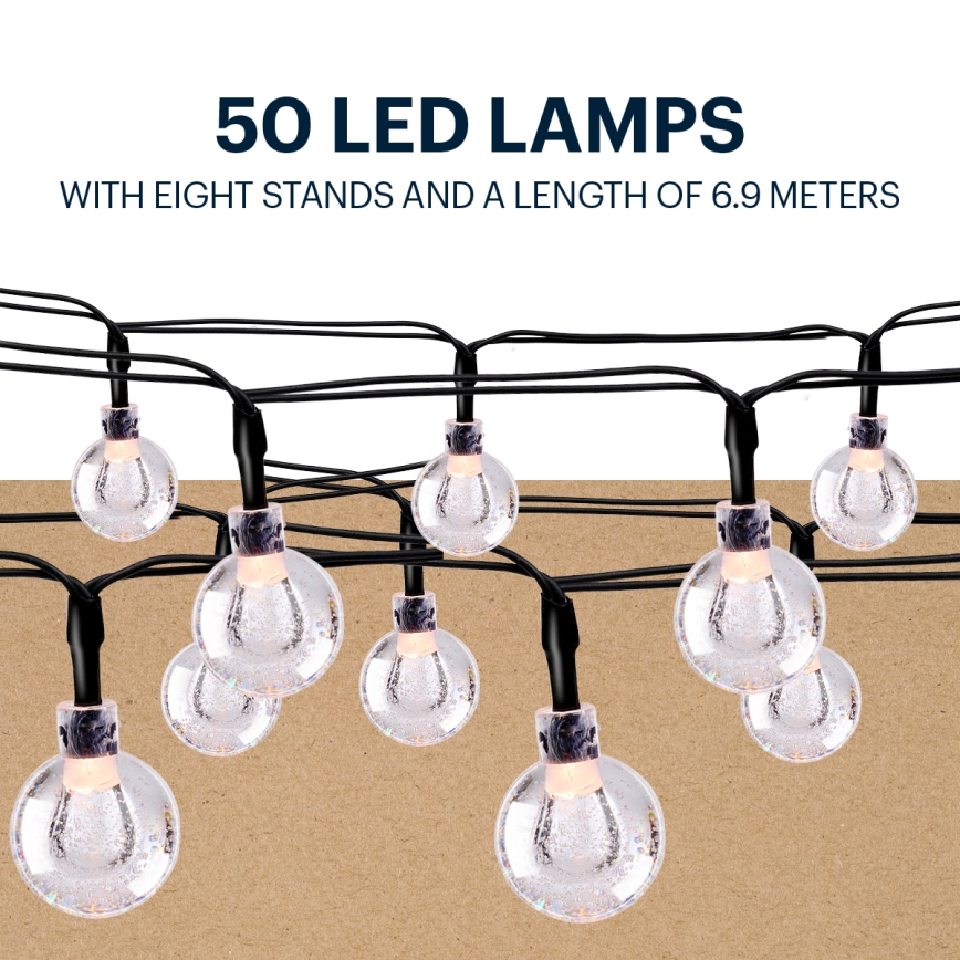 Grundig - LED Соларна верига 50xLED/8 функции 6,9m топло бяло