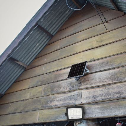 Димируем соларен LED прожектор LED/50W/3,2V 2000-8000K IP65 3800 mAh черен + дистанционно управление