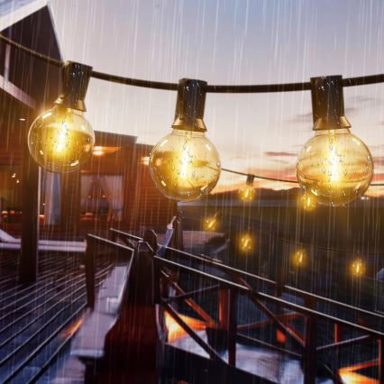 LED външен декоративен гирлянд с възможност за димиране 25xE12/1W/24/230V 17,5 m IP65 черен + дистанционно управление