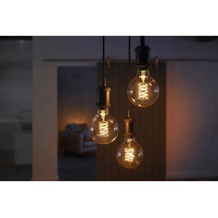 LED Димируема крушка Philips Hue WHITE FILAMENT G93 E27/7W/230V 2100K