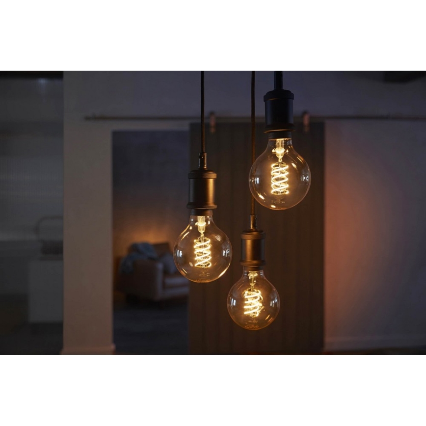LED Димируема крушка Philips Hue WHITE FILAMENT G93 E27/7W/230V 2100K