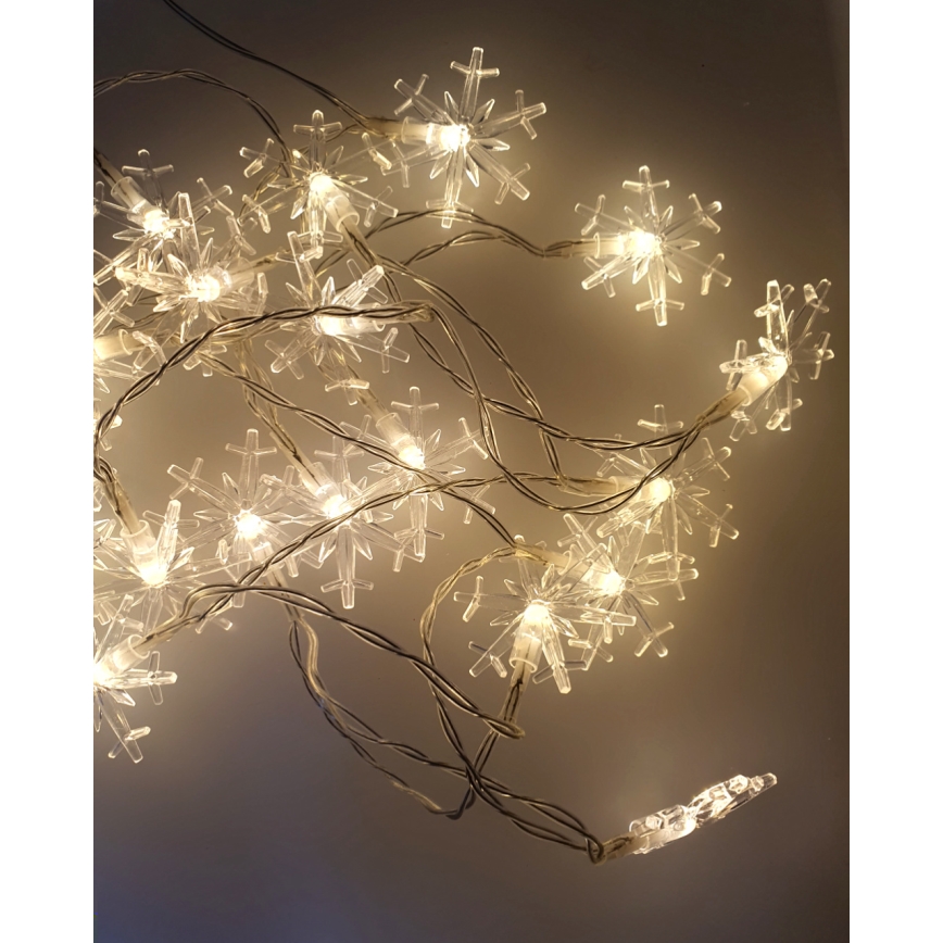 LED външна гирлянда 20xLED/2xAA 2,2 m IP44 топло бяло снежинки
