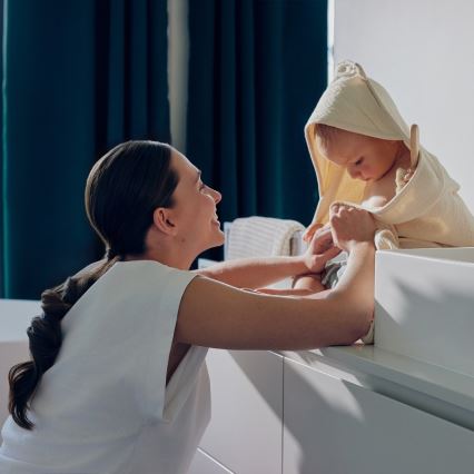 Lionelo - Детска муслинова хавлия с качулка, беж капучино