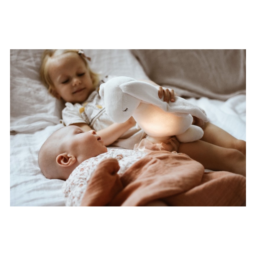 Moonie - Приятел за гушкане с мелодия и светлина зайче powder