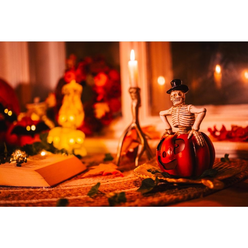 LED Декорация HALLOWEEN LED/2xLR44/топло бял скелет в тиква смола