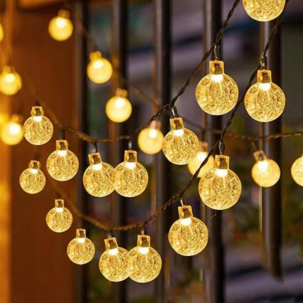 Соларна LED декоративна гирлянда 50xLED/8 режима 500 mAh 9,5 m IP67 топла бяла